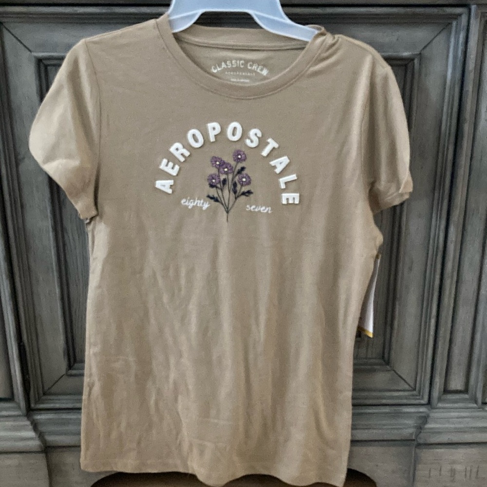 BRAND NEW WOMANS TEE SHIRT SIZE MEDIUM! NWT! SMOKE FREE HOME!